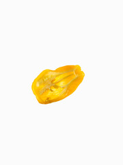 Half a bright yellow habanero pepper. Levitation. Hot Mexican pepper. Used for making hot sauces and seasonings. White background. Minimalism. There is an empty space for your insert.