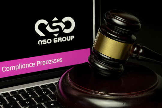 Gavel placed on laptop with blurred NSO Group website. Israeli company known for its surveillance software. Selective focus. Stafford, United Kingdom, July 19, 2021.