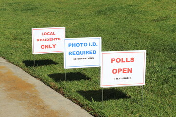 Signs along the walkway leading to the polling place