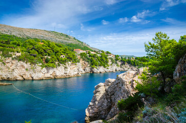 Fototapeta na wymiar Hiden beach with rocks in Dubrovnik, Croatia