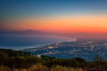 Aerial night view of Kalamata city, Greece. Kalamata is one of the most beautiful cities in Greece and a popular tourist destination