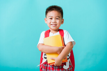 Back to school concept. Portrait Asian happy funny cute little child boy smiling and laugh hug...