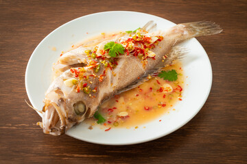 Steamed grouper fish with lime and chillies