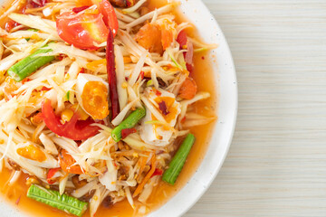 Som Tum - Thai Spicy green papaya salad with salty eggs