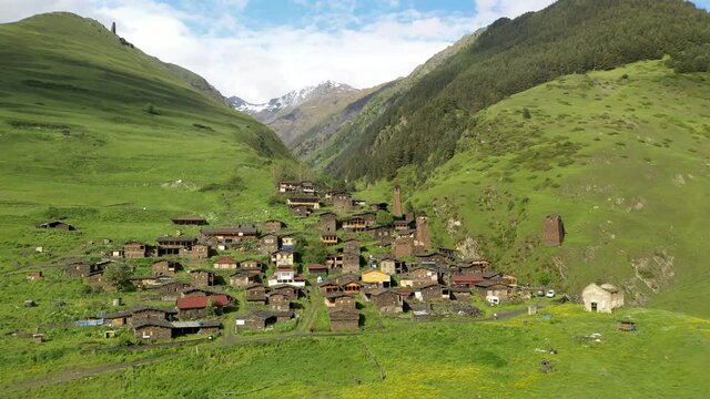 Rotating drone shot of Dartlo Village in Tusheti Georgia with medieval combat towers