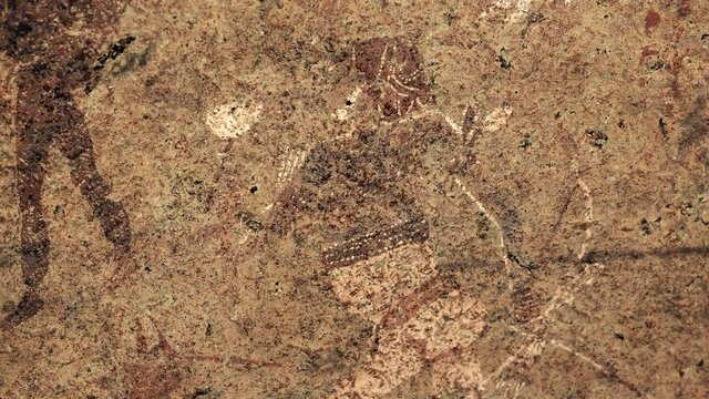 Closeup of ancient prehistoric cave painting known as the White Lady of Brandberg dating back at least 2000 years and located at the foot of Brandberg Mountain in Damaraland, Namibia, Africa.