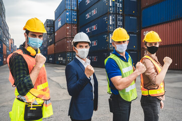 Businessmen, executives and engineers wear medical face masks. While inspecting industrial plants and warehouses for international shipping businesses Concepts of import and export.