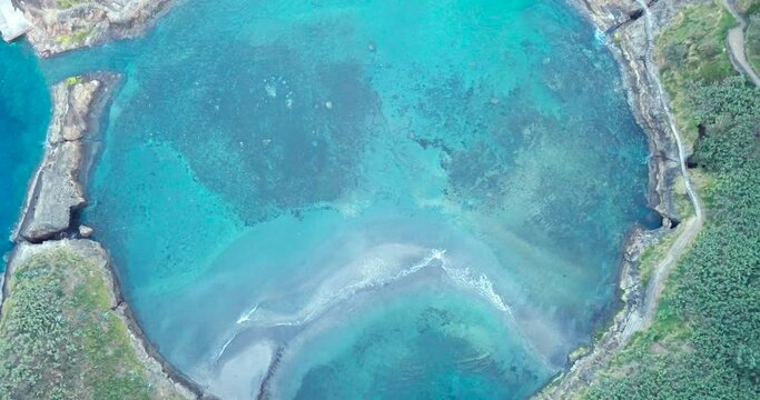 Aerial drone footage of the tropical island of Vila Franca do Campo in Azores islands.