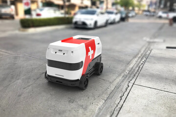 Autonomous Robot with a first aid kit is on the road.