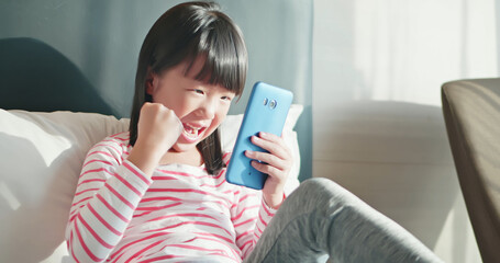 Girl Play Game on Smartphone
