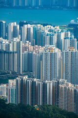 Obraz premium Hong Kong Victoria harbor city landscape, business downtown urban with skyline building tower, Asia district scene of skyscraper architecture view to travel