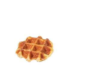 Round waffle, a close up of traditional homemade delicious crispy waffle cake dessert isolated on white background.