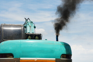Black smoke from incomplete combustion is released from the engine. air pollution problem.