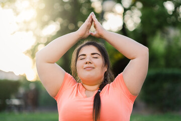 Meditation harmony. Body positive. Yoga outdoor. Mind freedom. Relaxed joyful overweight obese...