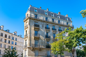 Fototapeta premium Paris, beautiful buildings, avenue de la Republique in the 11e district 
