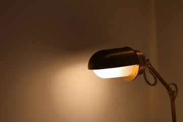 lamp in front of a wall