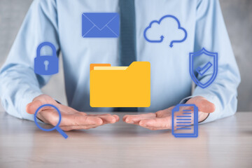 Document Management System DMS .Businessman hold folder and document icon.Software for archiving,...