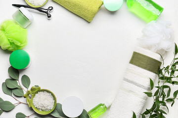 Frame made of bath supplies on light background