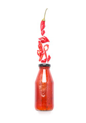Obraz premium Bottle of chili sauce on white background