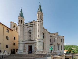 Fototapeta na wymiar The ancient Basilica of Santa Rita, in the historic center of Cascia, Perugia, Italy