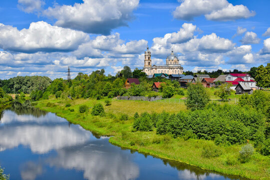 Gus River landscape in Gus-Zhelezny village with the Trinity Church, Ryazan region of Russia