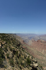 Wide angle view of the south rim of the Grand Canyon on a sunny day with clear blue skies