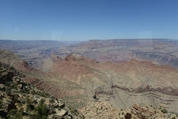 Fototapeta na wymiar Wide angle view of the south rim of the Grand Canyon on a sunny day with clear blue skies