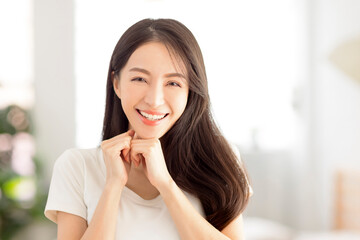 Fototapeta na wymiar closeup smiling young woman face with clean and healthy skin