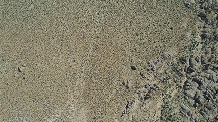 Aerial Snow on mountain peaks, Lone Pine Desert, California
