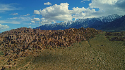 Aerial Snow on mountain peaks, Lone Pine Desert, California