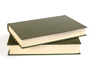 Green hardcover books on a white background. Two closed books.