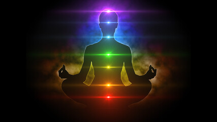 Meditating figure in lotus pose with colorful aura and chakras - 446185254