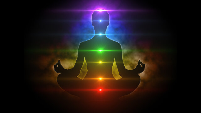Meditating figure in lotus pose with colorful aura and chakras