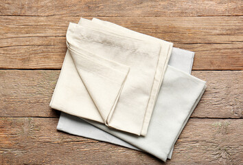 Fabric napkins on wooden background