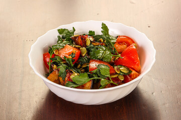Salad with fresh vegetables and onion