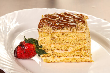 Sweet layered cake served strawberry