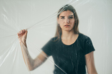 Feeling helpless. Female emancipation. Woman rights. Self isolation. Defocused portrait of sad...