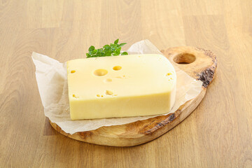 Maasdam cheese over the board