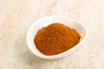 Dry Paprika powder in the bowl