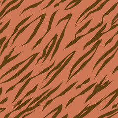 Tiger animal print in orange and brown tones, vectored and seamless pattern. Textile or paper safari pattern.