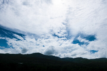 Sky and cloud concept Beautiful Blue sky and mountains. Beautiful Cumulus Cloud in the Bright Sky Background