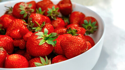 Close view of a plate of strawberries