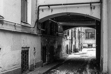 Arch inside courtyard of typical St Petersburg vintage apartment house