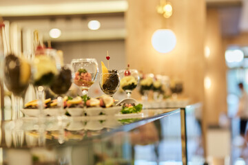 Vegetable sauces for picking up from buffet for hotel system of all-inclusive. Vegetables stew with greenery