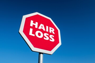 Stop traffic sign with text HAIR LOSS to prevent alopecia