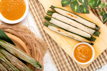 Otak-otak is a Southeast Asian fish cake made of ground fish meat mixed with spices and wrapped into leaf parcels.Otak-otak is traditionally served fresh,encased within the leaf parcel it is cooked in