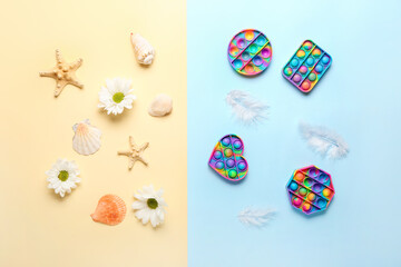 Composition with pop it fidget toys on color background