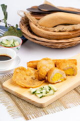 Pempek or empek-empek is a savoury Indonesian fishcake delicacy, made of fish and tapioca, from Palembang South Sumatera, Indonesia. Pempek is served with rich sweet and sour sauce called kuah cuko