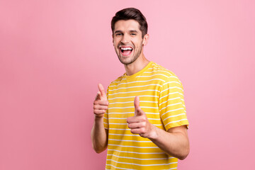 Photo of charming cool happy man point fingers you good mood winner isolated on pastel pink color...
