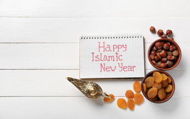 Festive composition for Islamic New Year on white wooden background